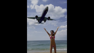 Monika Fox Poses In Pink Bikini With Stars On Beach